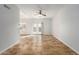 Bright living room with tile floors and sliding glass doors at 6705 W Orchid Ln, Peoria, AZ 85345
