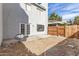 Private backyard with patio and view of neighboring homes at 6705 W Orchid Ln, Peoria, AZ 85345