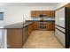 Modern kitchen featuring stainless steel appliances and granite countertops at 3500 E Cowboy Cove Trl, San Tan Valley, AZ 85143