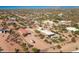 Aerial view showcasing property, pool, and stables at 15339 E Red Bird Rd, Scottsdale, AZ 85262