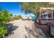 Backyard featuring raised garden beds and desert landscaping at 15339 E Red Bird Rd, Scottsdale, AZ 85262