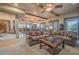 Spacious living room with exposed beams and a cozy seating area at 15339 E Red Bird Rd, Scottsdale, AZ 85262
