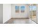 Bright bonus room with sliding glass doors to backyard at 9911 S Caballo Dr, Apache Junction, AZ 85120