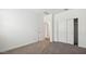 Bedroom with double door closet and access to bathroom at 9911 S Caballo Dr, Apache Junction, AZ 85120