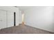 Spacious bedroom with double door closet and neutral wall at 9911 S Caballo Dr, Apache Junction, AZ 85120