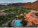 Aerial view of property with pool and golf course views at 18720 N 101St St # 2017, Scottsdale, AZ 85255