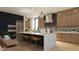 Modern kitchen with island and stainless steel appliances at 18720 N 101St St # 2017, Scottsdale, AZ 85255