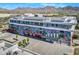 Building with unique mural and solar panels; mountain views at 16580 N 92Nd St # 2001, Scottsdale, AZ 85260