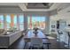 Dining area with a large window overlooking the pool and patio at 11165 E Gold Dust Ave, Scottsdale, AZ 85259