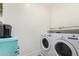 Laundry room with modern washer and dryer, and extra storage space at 1406 W Main St # 137, Mesa, AZ 85201
