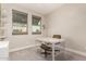 Home office with two windows, a white desk, olive green chairs, and carpet at 1406 W Main St # 137, Mesa, AZ 85201