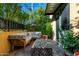 Relaxing patio space with outdoor furniture and vibrant landscaping at 1406 W Main St # 137, Mesa, AZ 85201