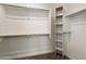 Walk-in closet with shelving and hanging rods at 2927 N Augustine --, Mesa, AZ 85207