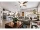 Living room with open floor plan and view into kitchen at 16789 W Taylor St, Goodyear, AZ 85338