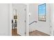 Modern staircase with a window and wood flooring at 4220 N 32Nd St # 1, Phoenix, AZ 85018