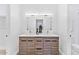 Modern bathroom with double vanity and wood cabinets at 4220 N 32Nd St # 1, Phoenix, AZ 85018