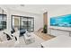 Open living area with contemporary furniture and large TV at 4220 N 32Nd St # 1, Phoenix, AZ 85018