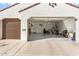 Spacious two-car garage with ample storage space at 16944 W Coronado Rd, Goodyear, AZ 85395