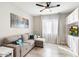 Cozy Gathering room offers comfortable seating and built-in entertainment center at 16944 W Coronado Rd, Goodyear, AZ 85395