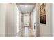 Bright and airy hallway with tile flooring at 16944 W Coronado Rd, Goodyear, AZ 85395