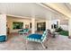 Spacious covered patio with comfortable lounge seating at 16944 W Coronado Rd, Goodyear, AZ 85395