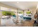 Relaxing outdoor patio with seating area and fireplace at 16944 W Coronado Rd, Goodyear, AZ 85395