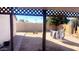 Large backyard with covered patio, grassy area, and space for outdoor activities at 9618 N 66 Dr, Glendale, AZ 85302