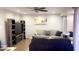 Bright living room featuring comfortable seating and built-in shelving at 9618 N 66 Dr, Glendale, AZ 85302