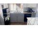 Updated kitchen with stainless steel appliances and double sink at 9618 N 66 Dr, Glendale, AZ 85302
