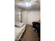 Cozy bedroom with double bed, closet, and ceiling fan at 9618 N 66 Dr, Glendale, AZ 85302
