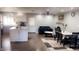 Open concept dining area with kitchen and living room view at 9618 N 66 Dr, Glendale, AZ 85302