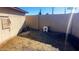 Side yard with gravel and small storage area at 9618 N 66 Dr, Glendale, AZ 85302