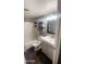 Modern bathroom with a bathtub, toilet, and vanity at 9618 N 66 Dr, Glendale, AZ 85302
