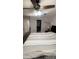 Spacious Primary bedroom with a king-size bed and plenty of closet space at 9618 N 66 Dr, Glendale, AZ 85302