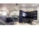 Living room with built-in electric fireplace and TV stand at 9618 N 66 Dr, Glendale, AZ 85302