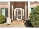 Front entry with terracotta tile and security door at 15203 N Castillo Dr, Fountain Hills, AZ 85268