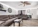 Living room with sectional sofa and coffee table at 6213 W Palm Ln, Phoenix, AZ 85035