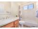 Clean bathroom with shower/tub combo and updated vanity at 18478 N Canal Dr, Surprise, AZ 85374