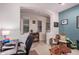 Bright home office space with built-in shelving and a large work surface at 18478 N Canal Dr, Surprise, AZ 85374