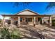 Home exterior showcasing a covered patio at 18478 N Canal Dr, Surprise, AZ 85374