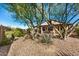 Relaxing patio area with covered seating at 18478 N Canal Dr, Surprise, AZ 85374