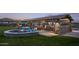Community gathering space with fire pit and seating at 12311 W Parkway Ln, Avondale, AZ 85323