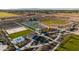 Aerial view of community amenities including sports fields and courts at 12311 W Parkway Ln, Avondale, AZ 85323