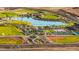 Aerial view of community amenities including lake, playground and sports fields at 12311 W Parkway Ln, Avondale, AZ 85323