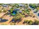 Aerial view of house, pool, and surrounding desert landscape at 10647 N 82Nd Pl, Scottsdale, AZ 85260