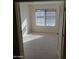 Bright bedroom with tile flooring and large window at 818 S Westwood St # 104, Mesa, AZ 85210