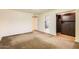 Spacious bedroom with walk-in closet and bathroom access at 15243 N 52Nd Dr, Glendale, AZ 85306