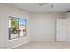 Well-lit bedroom with mountain views from large window at 14000 N 94Th St # 3200, Scottsdale, AZ 85260