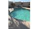 Refreshing kidney-shaped pool perfect for relaxation at 1440 N Idaho Rd # 2041, Apache Junction, AZ 85119
