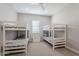 Spacious bedroom featuring two sets of bunk beds, perfect for a Gathering at 2200 E Aquarius Pl, Chandler, AZ 85249